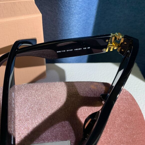 Miu Miu Black Oval Sunglasses • Gold Logo Statement main image 7